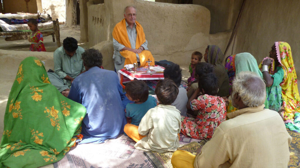 Fr Brendan MHM saying mass in Pakistan