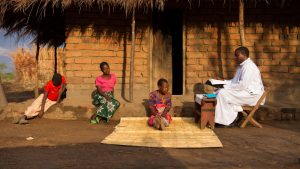 fr Santos brings communion to parishioners