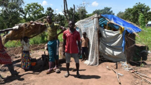 Families who have lost their homes are forced to build temporary shelters