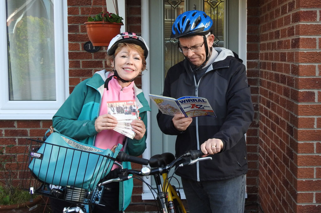 Trish and her husband setting out to deliver Missio material to Red Box holders