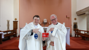 Fr Daniel and Fr Anthony with the Red Box