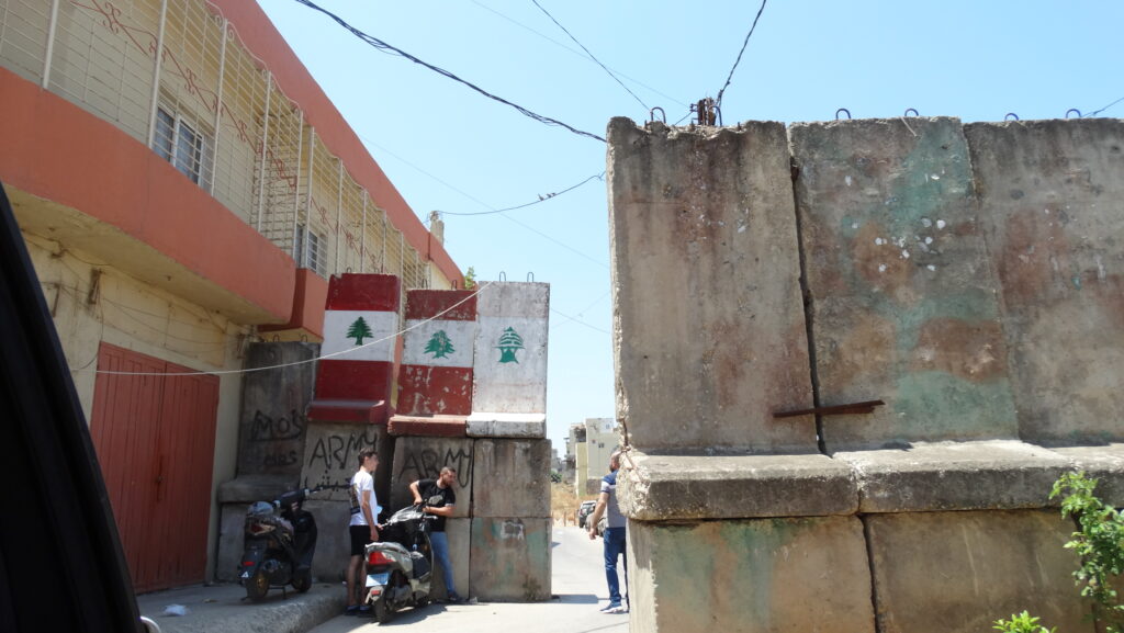 Lebanese flags on a wall in Tripoli