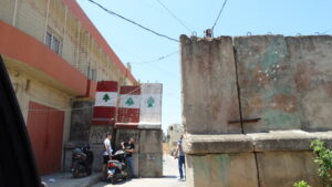 Lebanese flags on a wall in Tripoli
