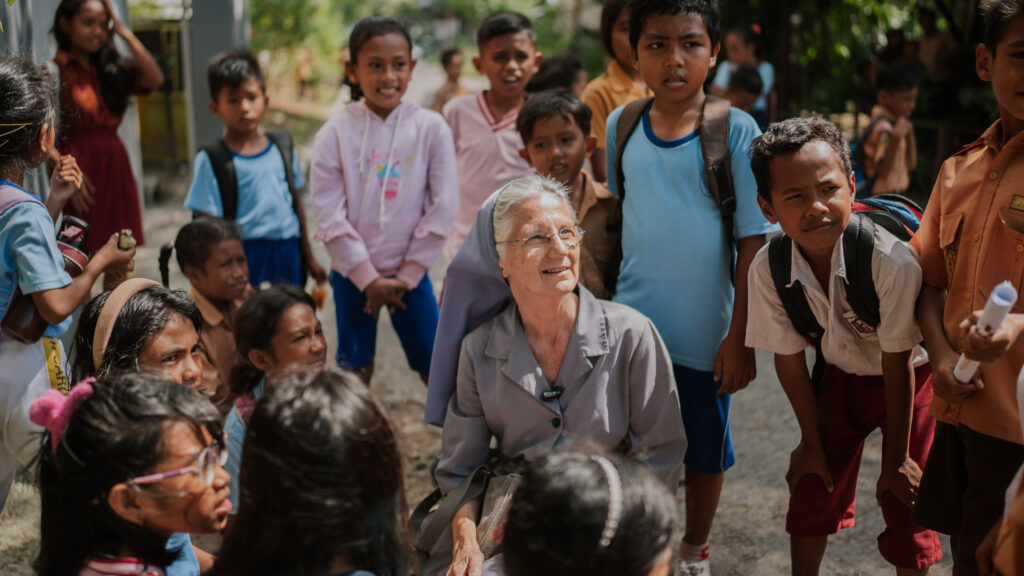 A Sister working with children in Indonesia