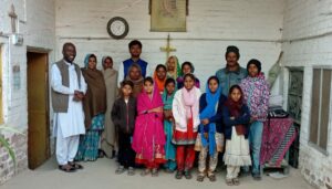 Fr Zach with Pakistani community