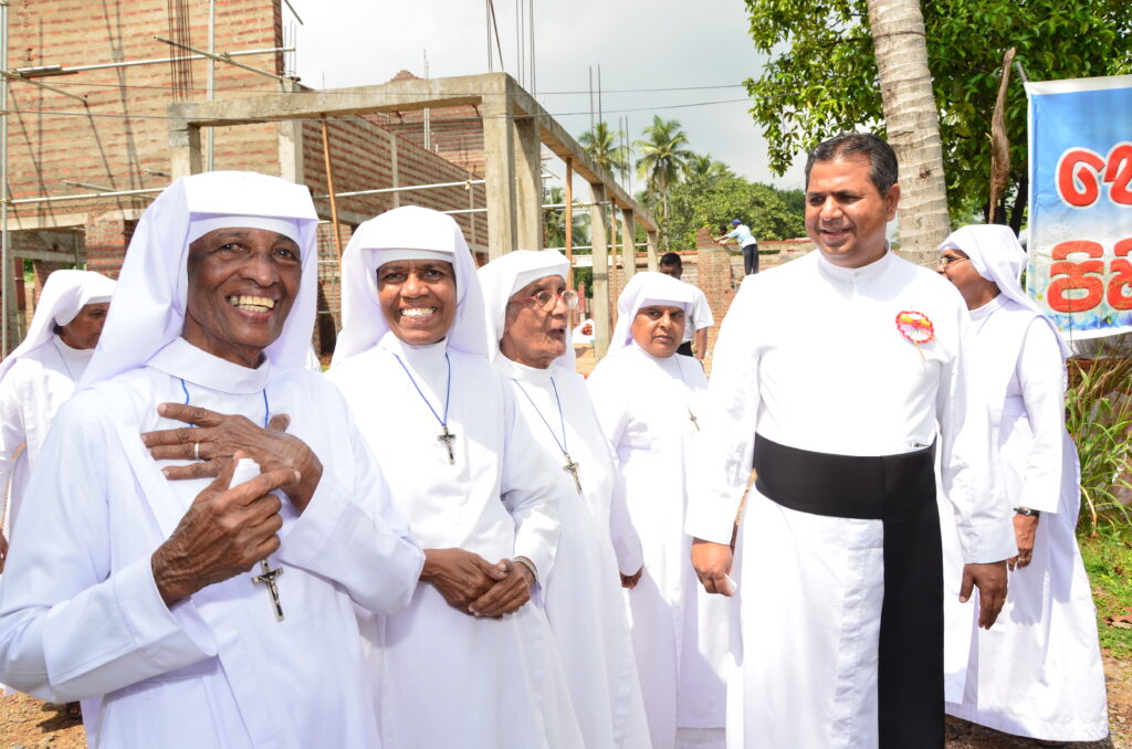 Holy Angel Religious Sisters with Fr Basil, National Director of Missio in Sri Lanka